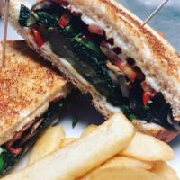 Sauteed Veggie Sandwich ·  mushrooms, roasted bell peppers, tomato, spinach, mozzarella cheese and organic olive oil o...