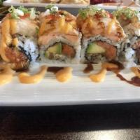Fusion Roll · Spicy crunchy tuna, eel, avocado, topped with fried salmon, scallion, masago, eel sauce and ...