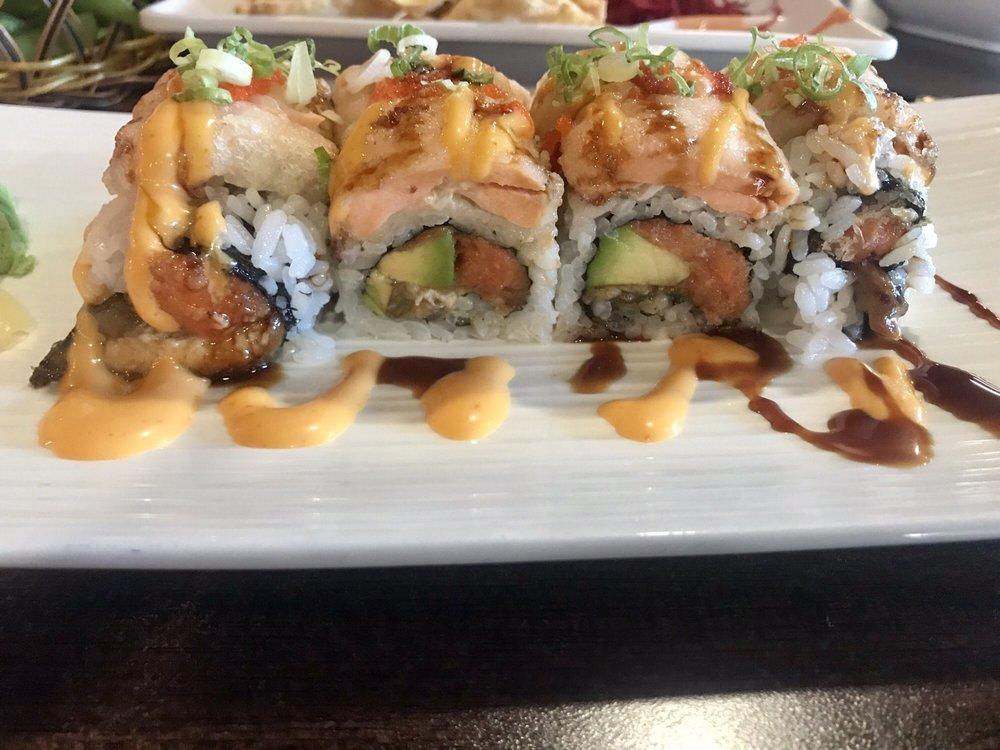 Fusion Roll · Spicy crunchy tuna, eel, avocado, topped with fried salmon, scallion, masago, eel sauce and spicy mayo.