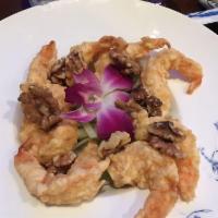 Walnut Shrimp · Crispy battered shrimp tossed in a creamy sweet mayonnaise mixture topped with sugar coate.