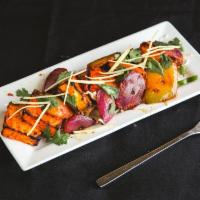 Paneer Tikka · Mouth melting cubes of cottage cheese marinated in traditional tandoori masala and cooked to...
