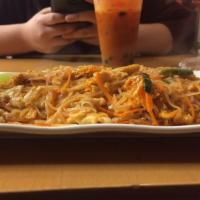 Pad Thai · Stir-fried noodles in fish sauce with beansprouts, shredded carrots, egg, scallion and peanu...