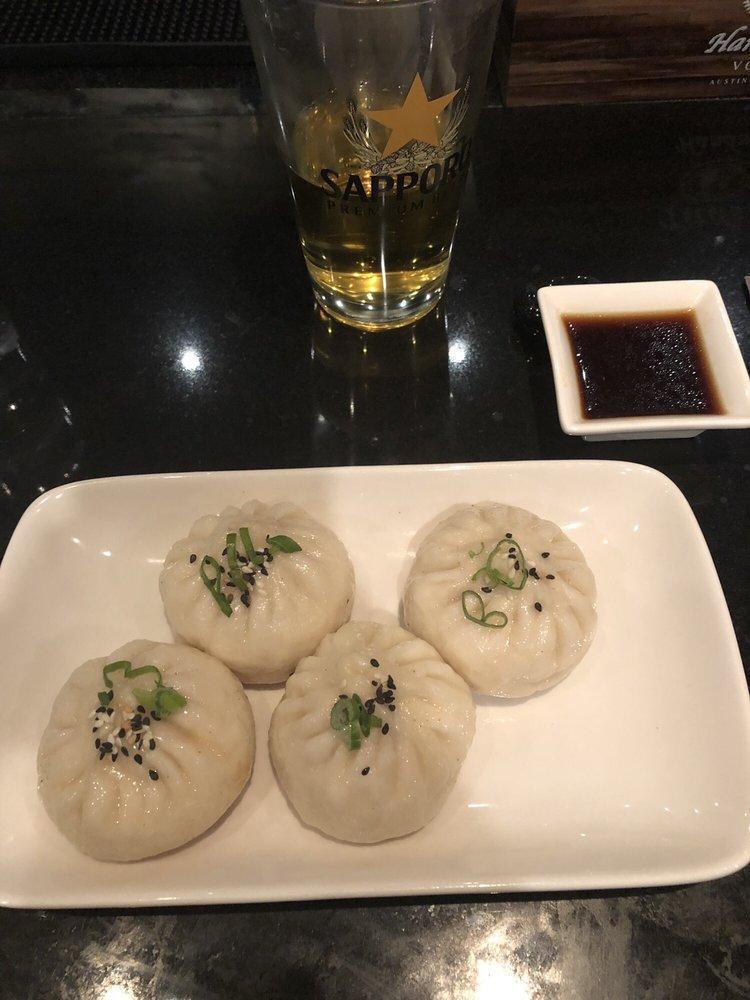 Pan Fried Pork Buns · 4 pieces.