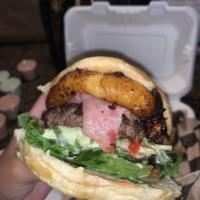 Tropical Burger · Meat, bacon, white cheese, ham, lettuce, tomato, crushed potato chips, fried sweet plantain,...