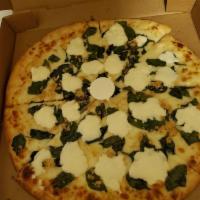 White Pizza · Ricotta cheese, mushroom, garlic, spinach, mozzarella cheese and olive oil.