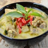 Thai Green Curry · Medium spicy curry in coconut milk, Thai eggplants, Thai basil, kaffir lime leaves, bell pep...