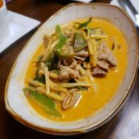 Thai Red Curry · Medium spicy curry in coconut milk, Thai eggplants, Thai basil, kaffir lime leaves, bell pep...