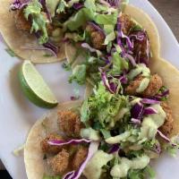 Fried Cauliflower Tacos · Gluten-free. 3 tacos. Red cabbage, shredded lettuce, avocado, pickled red onion, cilantro ca...