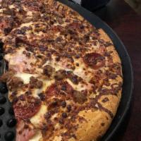 Meat Lovers Pizza · Fresh-made marinara, shredded mozzarella, pepperoni, sausage, Canadian bacon, and bacon. Sub...