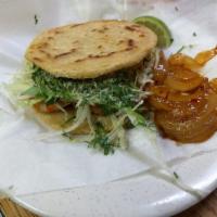 Gordita · Gordita with beans, meat of your choice, onion, cilantro, lettuce, and cheese with pickled o...