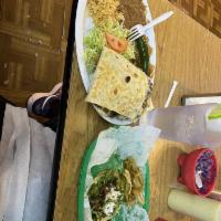 Quesadilla · Quesadilla with meat of your choice. Served with a side of rice and beans with a side salad,...