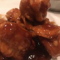 Orange Chicken · Chunks of chicken, breaded and deep fried with a sauce containing orange peels. Add white me...