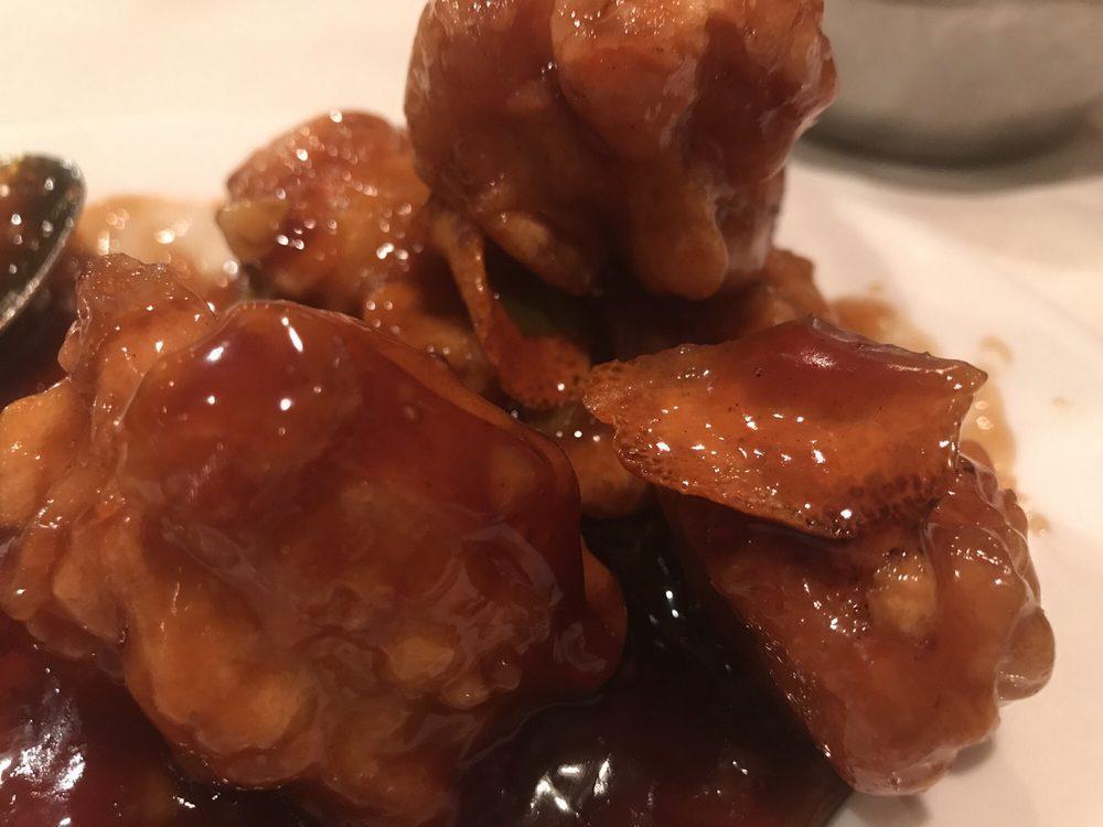 Orange Chicken · Chunks of chicken, breaded and deep fried with a sauce containing orange peels. Add white meat for an additional charge.