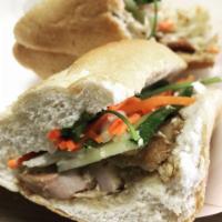 Grilled Lemongrass Chicken Sandwich · Grilled lemongrass chicken. Served with mayo, pickled vegetables, cucumber, cilantro, salt a...
