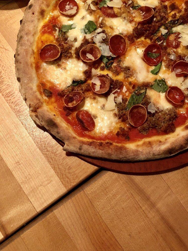 Con Carne Pizza · San marzano tomato sauce, mozzarella, sausage, pepperoni and chorizo.