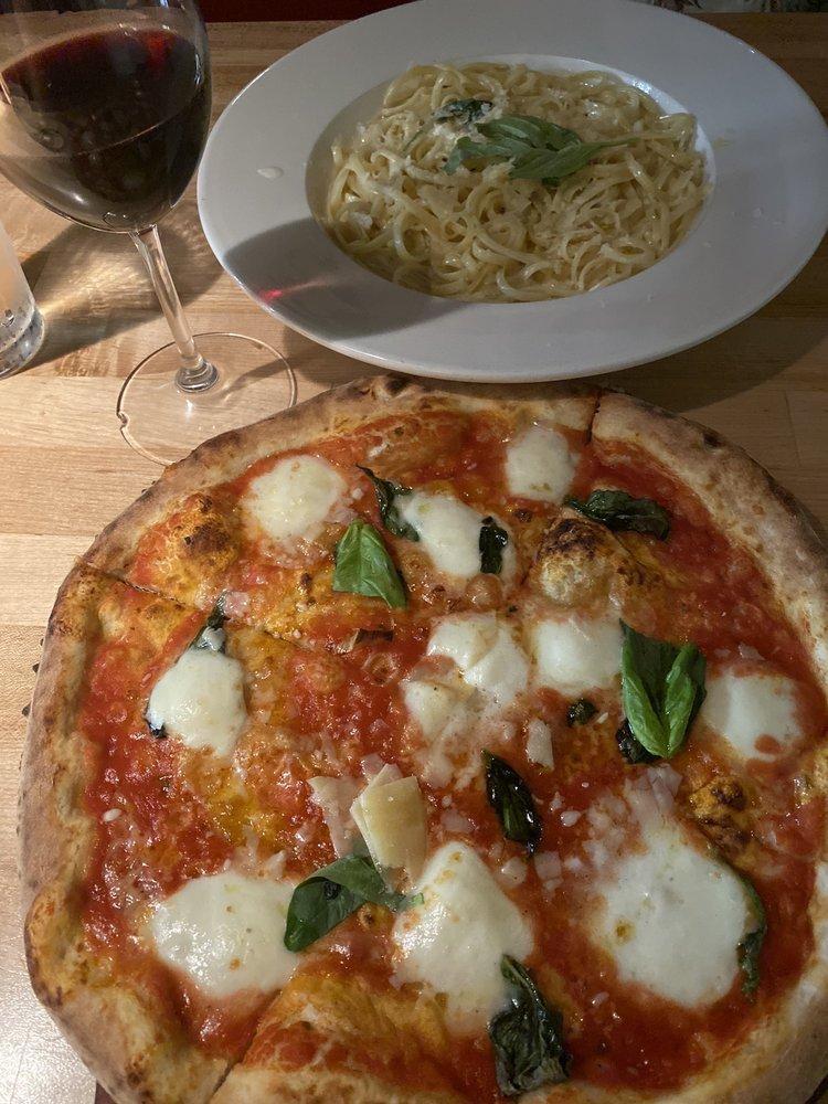 Margherita Pizza · Fresh mozzarella fior di latte, San marzano tomato sauce and basil. Vegetarian.