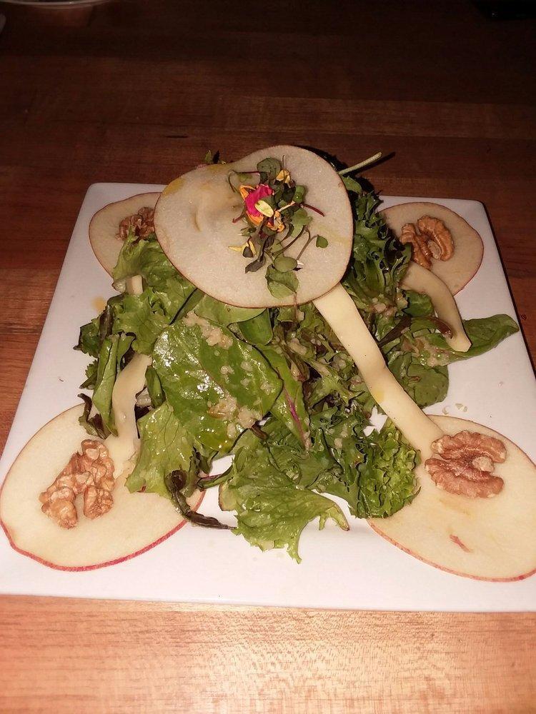 Credo Salad · Local organic greens, walnuts, sliced apples, fontina cheese and apple vinaigrette dressing. Vegetarian.