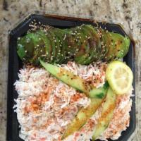 Arizona Bowl · Crabmeat and avocado, garnished with cucumber & lemon over
rice. It's like a California Rol...