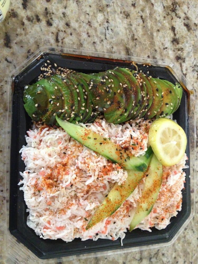 Arizona Bowl · Crabmeat and avocado, garnished with cucumber & lemon over
rice. It's like a California Roll in a bowl!