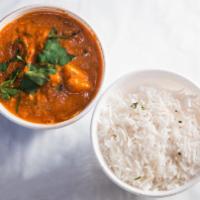 Butter Chicken · Chicken cooked in our tandoor, simmered in a creamy onion and tomato sauce, with herbs and s...