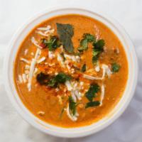 Shahi Paneer · Fresh cheese cooked in lightly spiced garlic and herbs tomato based cream sauce. Served with...