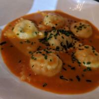 Crab & Chive Ravioli with Seafood Bisque · 