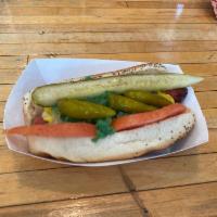 Chicago Style Hot Dog · Mustard, tomato, onion, relish, pickle, hot peppers and celery salt.
