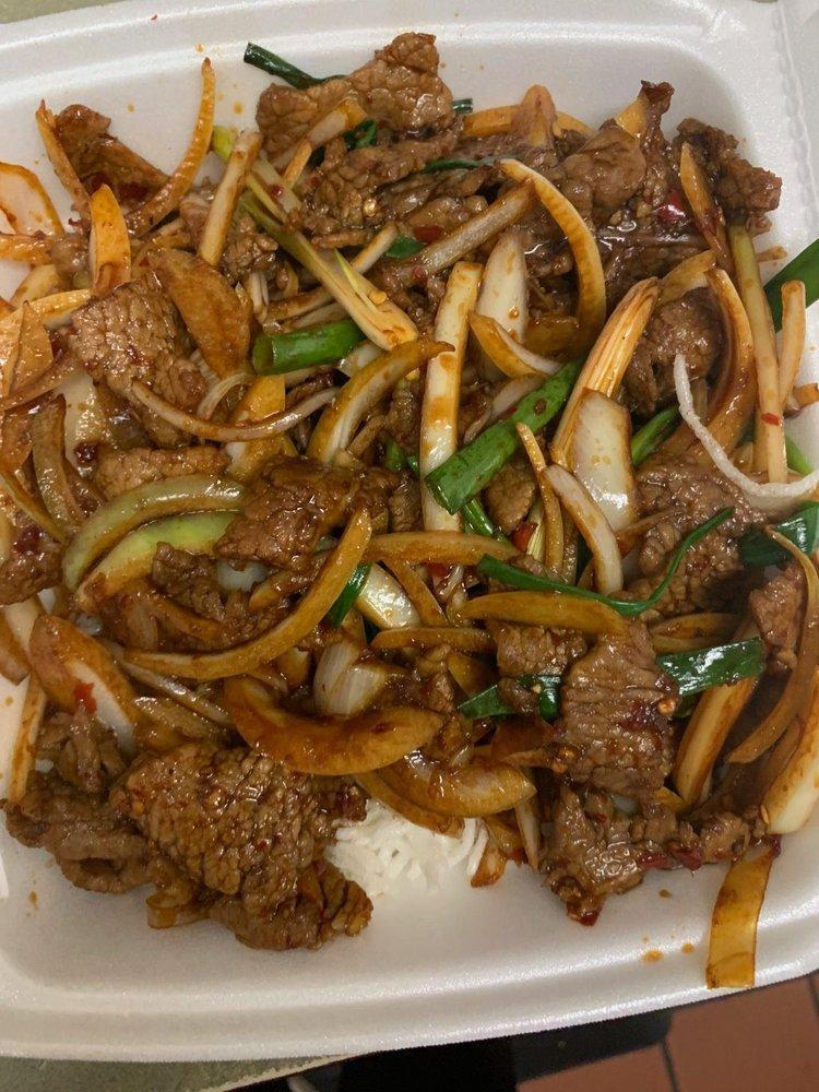 Mongolian Beef · Hot and spicy. Beef, onion, green onions with sweet and spicy sauce.