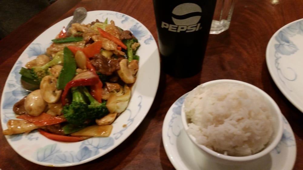 Happy Family · Shrimp, beef, chicken, BBQ pork, mixed vegetables in brown sauce.
