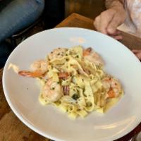 Shrimp Pappardelle · White wine, garlic, crushed red pepper, parsley