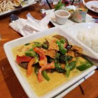 Green Curry · Eggplant, red and green bell peppers, coconut milk, basil and green curry paste.