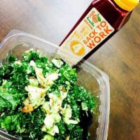 Orange Kale Salad · Kale, avocado, figs, hemp hearts, almonds and chia seeds, dressed with fresh orange juice an...