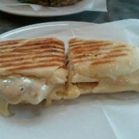 Code 2 Panini · Grilled chicken, Swiss, caramelized onion and Dijon mustard.