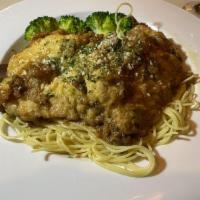 Chicken French · Dipped in egg, sauteed in butter with lemon and sherry wine, served over broccoli with a sid...