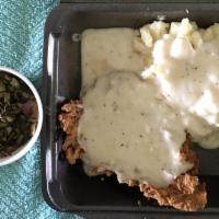 Chicken Fried Chicken · Fried and served with mashed potatoes, cream gravy, and 1 side.