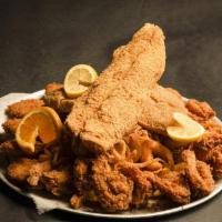Sailors Seafood Platter · 2 fried fish, 10 fried shrimp, 6 crab cake, 5 hush puppies, coleslaw, tornado fries, and fri...