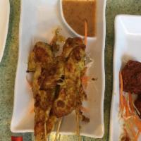 Chicken Satay · Grilled chicken with a side of peanut sauce. 