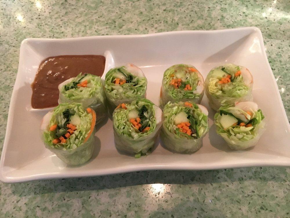2 Piece Vegetable Spring Roll · Crispy vegetable rolls served with sweet plum sauce. 