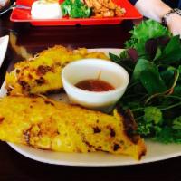 Vietnamese Crepes · Banh Xeo. Gluten Free. Coconut rice batter, bean sprout, herbs, leaf lettuce, and a side of ...