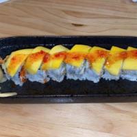 Yellow Mango Roll · In: Shrimp tempura, crab mix, cucumber
Top: mango
Sauce: mango sauce