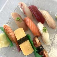 Nigiri Combination · Miso, salad and 9 pieces salmon, tuna, albacore, yellowtail, shrimp, fresh water eel, sea ba...