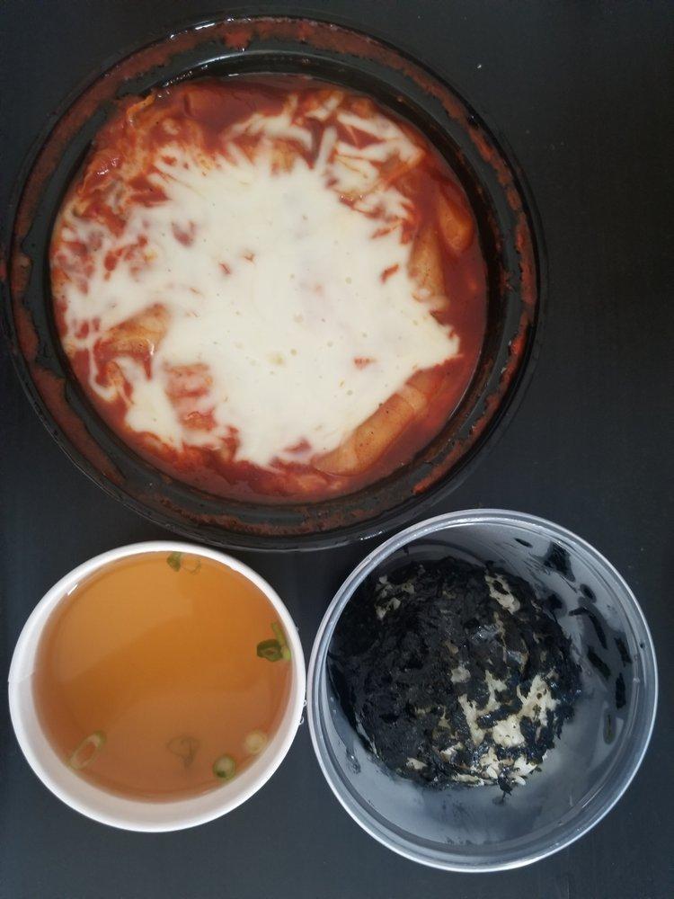 Assorted Yupgi Topokki · Served with rice cake, fish cake, Vienna sausage class noodle, cabbage, boiled egy and mozzarella cheese in yupgi special spicy sauce.
