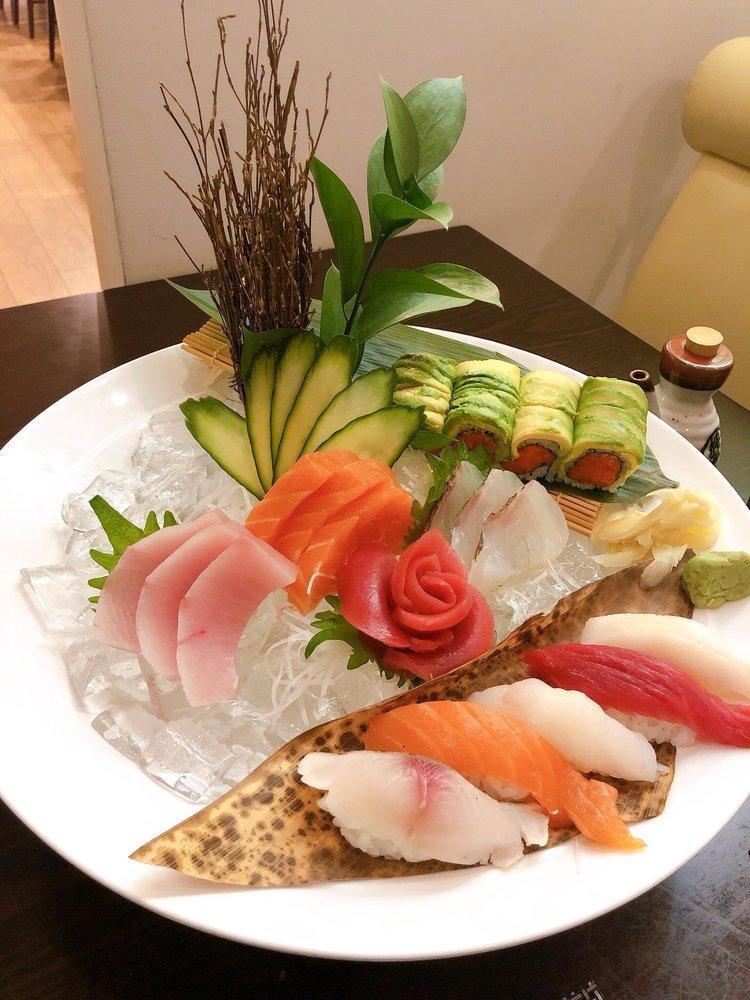 Sashimi Platter · With white rice, 16 pieces of chef's selected sashimi with exotic presentation. Comes with choice of side.