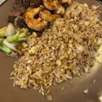Angus Steak and Shrimp Hibachi Combo Dinner · Clear soup or green salad, 2 pieces hibachi shrimp cooked together, hibachi vegetables and h...