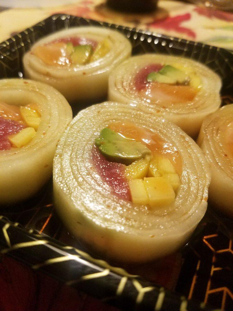 Edomae Roll · Tuna, salmon, crabmeat, and avocado wrap with cucumber skin (no rice).