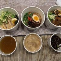 Tonkotsu Shio Ramen · Shio tare, pork broth, chashu pork, egg, black garlic oil, green onion, pickled ginger, kiku...