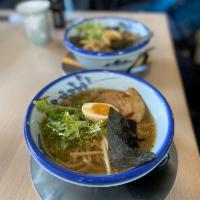 Yuzu Shoyu Ramen · Shoyu tare, chicken broth, yuzu, bamboo, egg, chashu pork, endive, fried garlic, and nori.