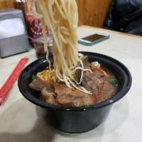 Hand Pulled Noodles with Beef in Hot and Spicy Soup · 