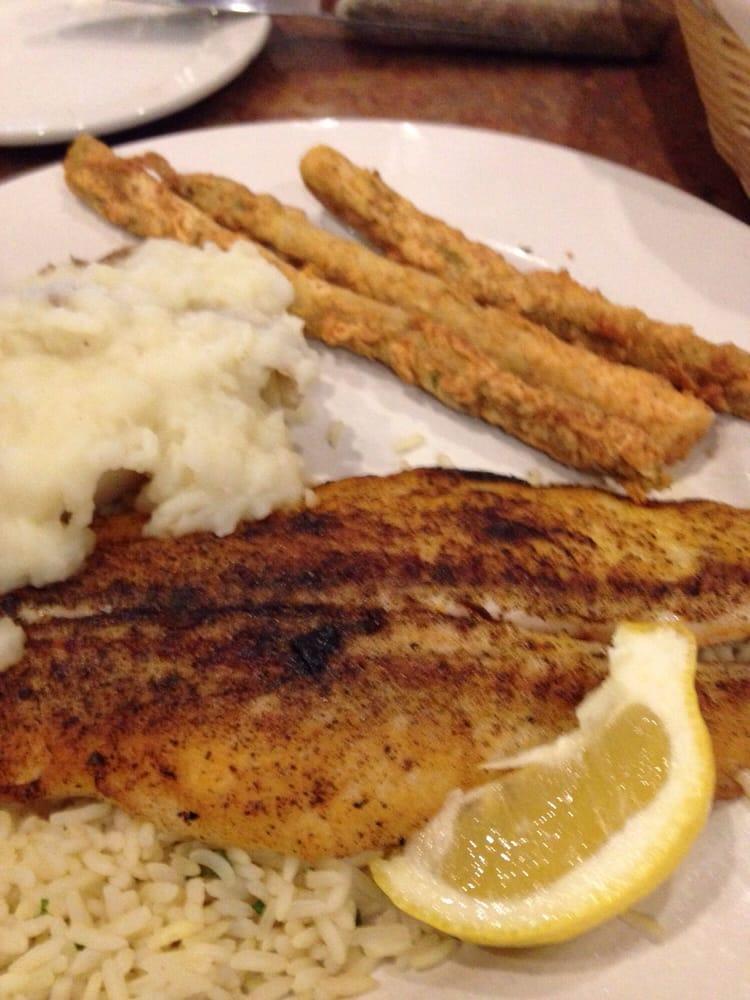 Catfish · 2 large filets grilled with blackened seasonings or deep fried with a cornmeal batter.