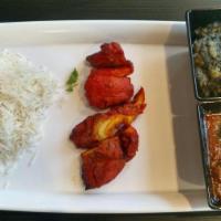 Chicken Reshmi Boti · Boneless chicken thigh marinated in blend of yogurt and spices. Perfectly barbequed to creat...